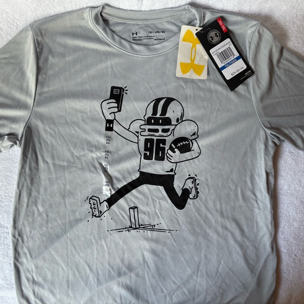 3 Tops - 2 Under Armour and 1 Reebok Kids Shirts - BNWT
Yellow UA top is sold.